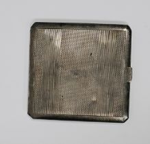 Elizabeth II silver cigarette case with Art Deco-style engine-turned decoration, gilt interior,