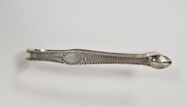 Pair of George III silver bright cut sugar tongs by Thomas Oliphant, 1ozt approx.