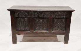 Jacobean-style oak chest of plain hinged top and carved and panelled front, 68cm high x 121cm wide x