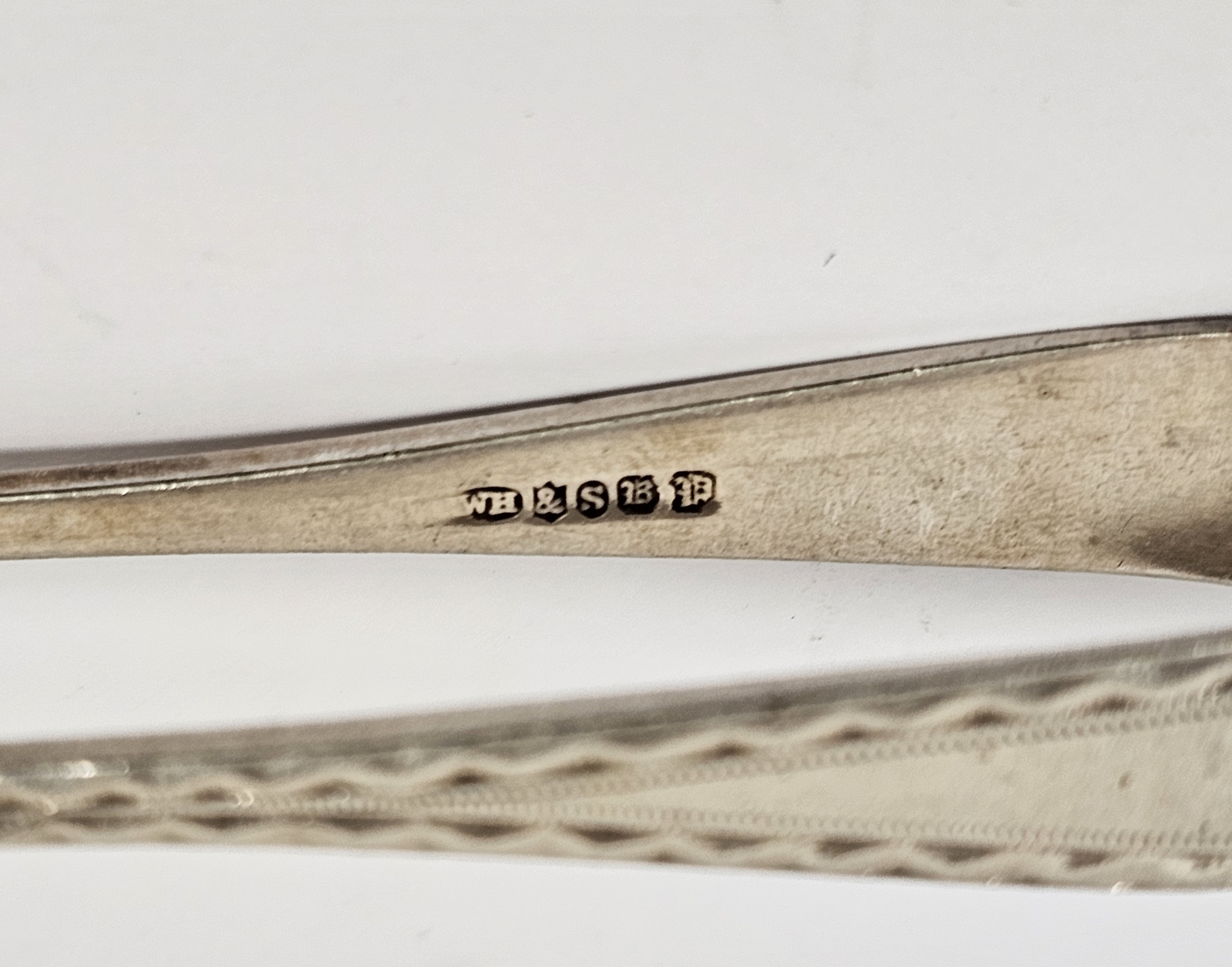 Pair of George III silver sugar tongs, London 1818, with engraved bright cut decoration, a pair of - Image 4 of 9