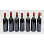 Three unlabelled bottles of Jean-Pierre Moueix red wine (JPM on capsule) and four other unlabelled