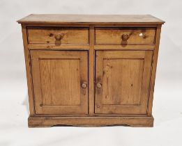 Victorian pine sideboard having two short drawers over a two-door cupboard, 86cm high x 104cm wide x