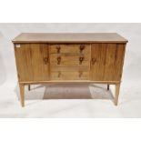 Mid-century teak sideboard by Vesper Furniture, having two single door cupboards and three short