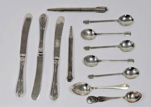 Two various silver-coloured metal propelling pencils, five silver coffee spoons with spade handles
