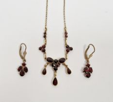 Gold and garnet necklace with pendant drops and similar pair drop earrings