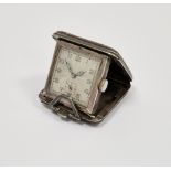 Early 20th century silver-cased folding watch housed in a leather case, the square watch dial having