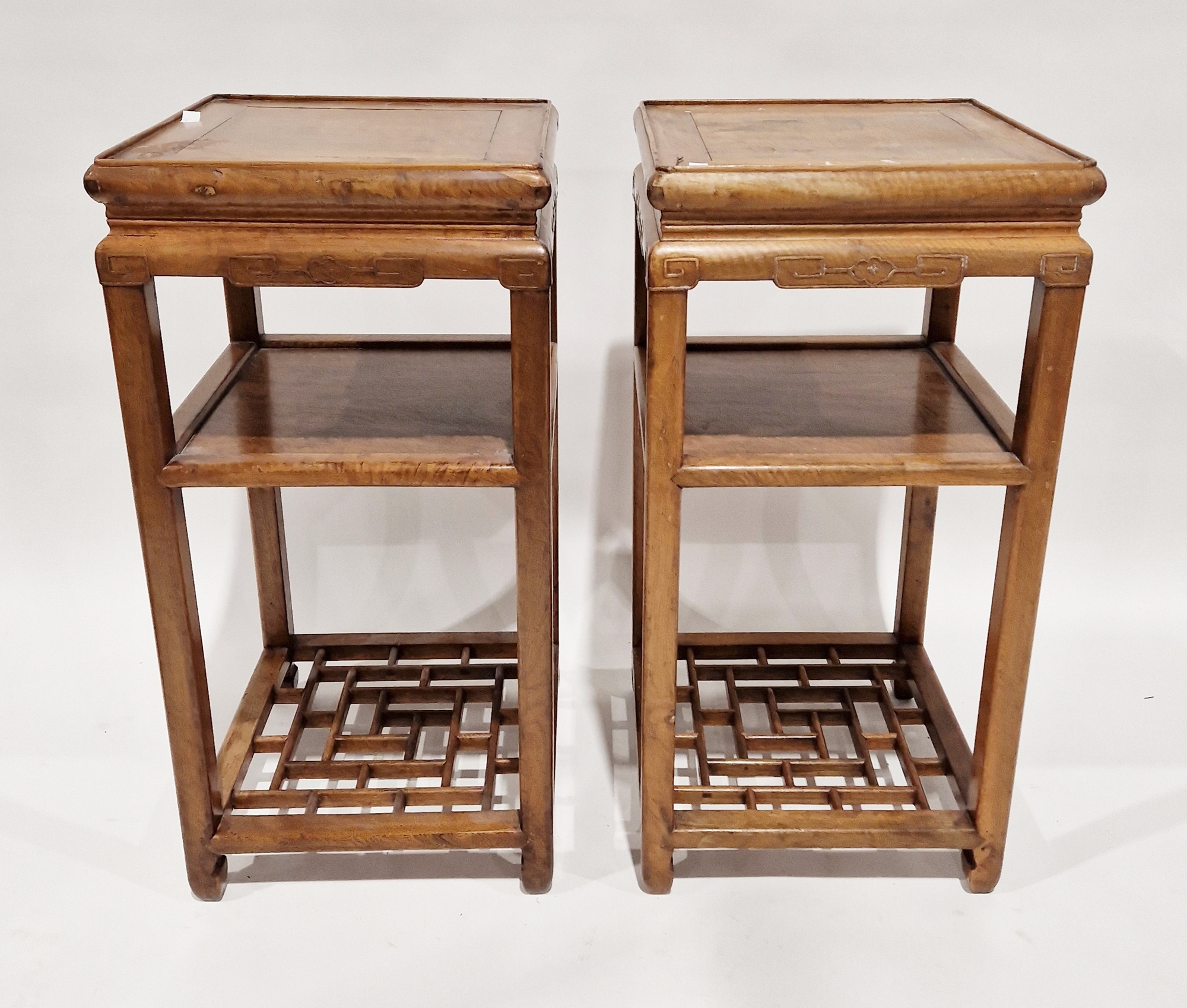 Pair of Chinese Longyanmu (tiger-skin wood) side tables, each of square form with stylised carved