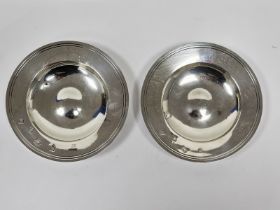 A pair of Queen Elizabeth II silver circular ashtrays/dishes, approximately 11.5cm diameter,