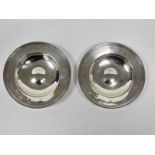 A pair of Queen Elizabeth II silver circular ashtrays/dishes, approximately 11.5cm diameter,