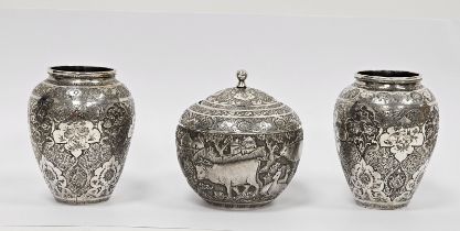 Pair of Persian/Iranian white metal vases of baluster form, densley decorated with shaped cartouches