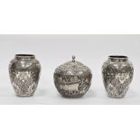 Pair of Persian/Iranian white metal vases of baluster form, densley decorated with shaped cartouches