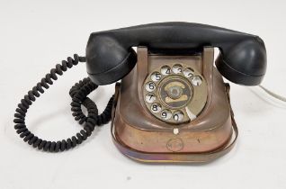 Vintage Belgium FTTR copper cased telephone, with black bakelite handset, inscribed RTT-56 to base