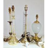 Four contemporary table lamps, comprising: a gilt-metal and frosted cracked ice pattern oviform