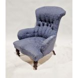 Late 19th/early 20th century armchair with partial buttonback and later upholstery, on castors, 77cm