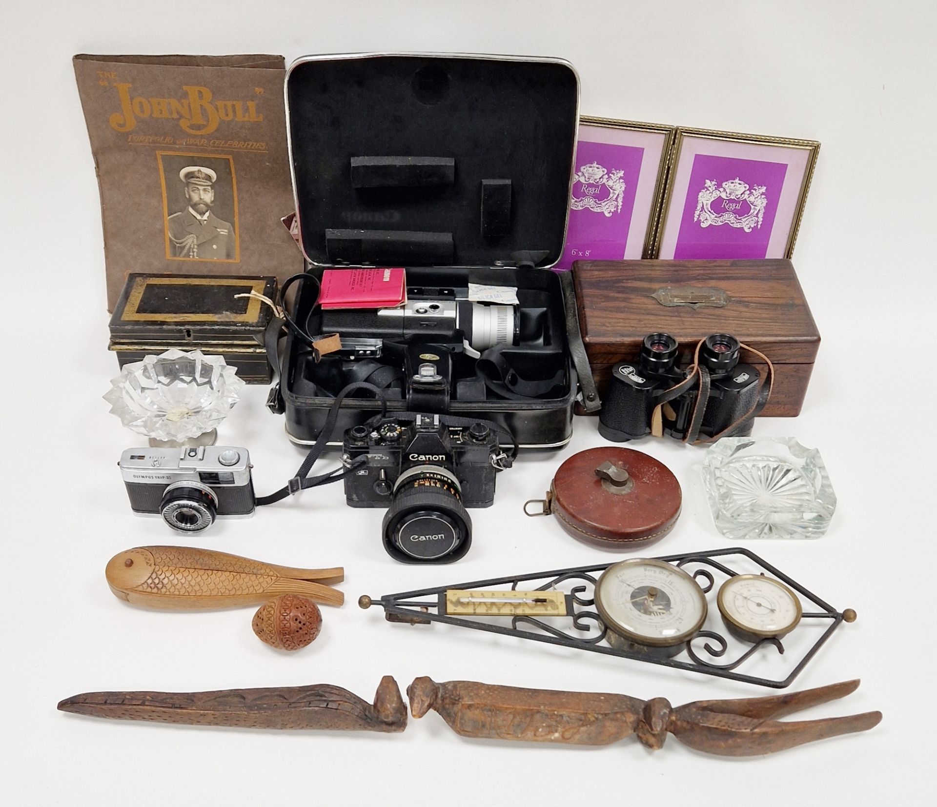 Very distressed Canon camera, a vintage leather tape measure, a pair of Zeiss binoculars in carry