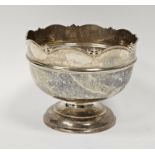 George V silver rose bowl with wavy rim, on circular pedestal base, Birmingham 1911 by Sanders &