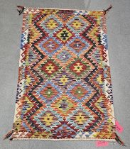 Chobi blue ground kilim,  with two rows of five hooked lozenges and one row of four, single