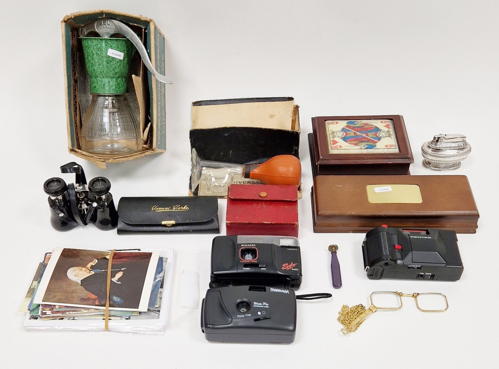 Vintage cream maker labelled Bell, Made in England, in original box, assorted cameras, a Ronson