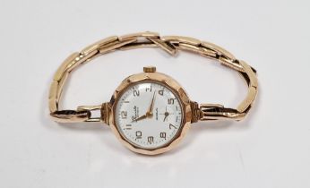 LOT WITHDRAWN Lady’s Precista 9ct gold wristwatch with scallop bezel, subsidiary seconds dial, on