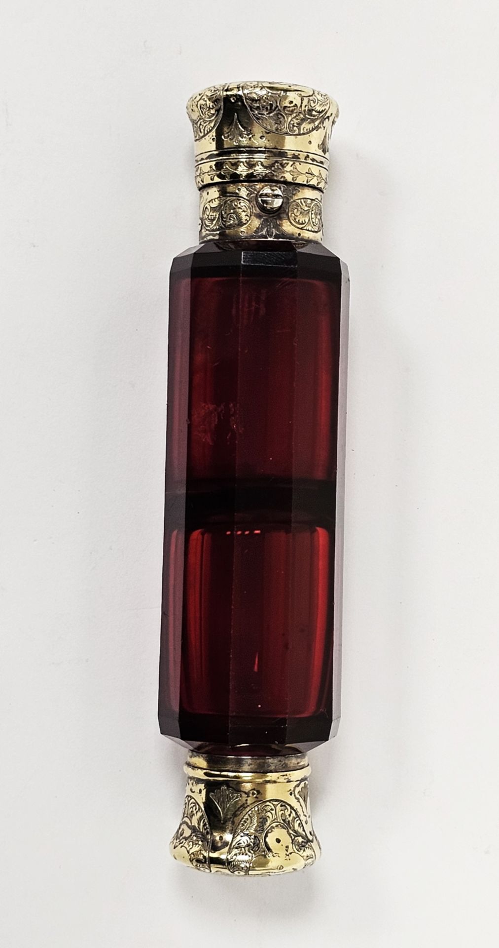 Victorian double-ended scent flask by S Mordan & Co, the faceted ruby glass body with an engraved