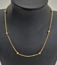 18ct gold herringbone and ball-pattern chain necklace, 5g  Condition Report Length approx. 40cm