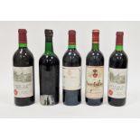 Four bottles of red wine including Chateau Soudars haut-medoc 1992, 1997 St Emillion and two bottles