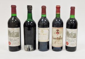 Four bottles of red wine including Chateau Soudars haut-medoc 1992, 1997 St Emillion and two bottles