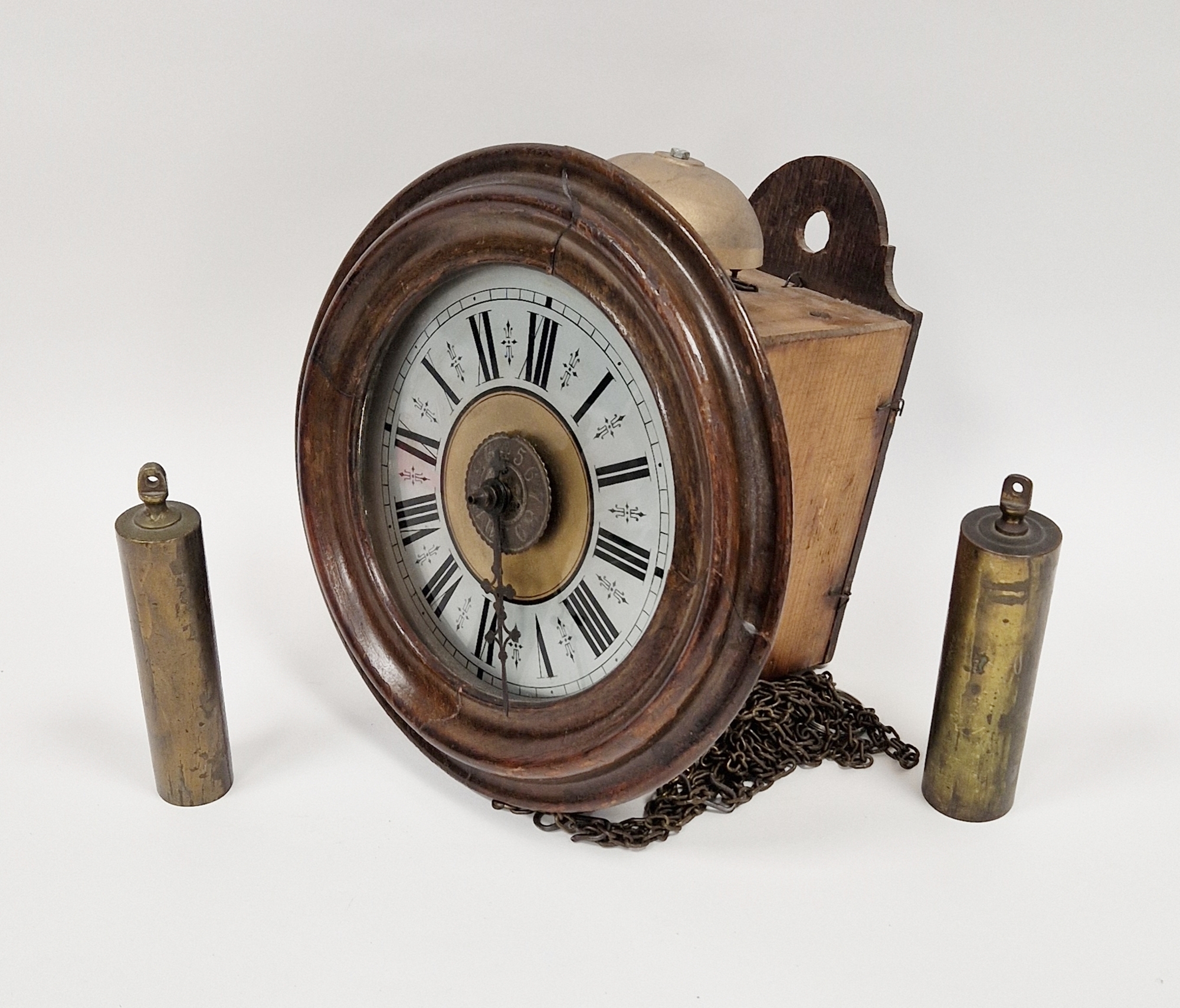 Mahogany cased postmans alarm clock with Roman numerals, inner Arabic numeral dial, 27cm diameter