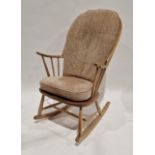 Ercol comb-back double bow "Chairmakers" Windsor rocking chair, the chair raised on sleigh runners