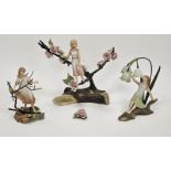 Wedgwood Four Seasons group of bisque porcelain and metal mounted figures, each sitting in a
