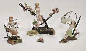 Wedgwood Four Seasons group of bisque porcelain and metal mounted figures, each sitting in a