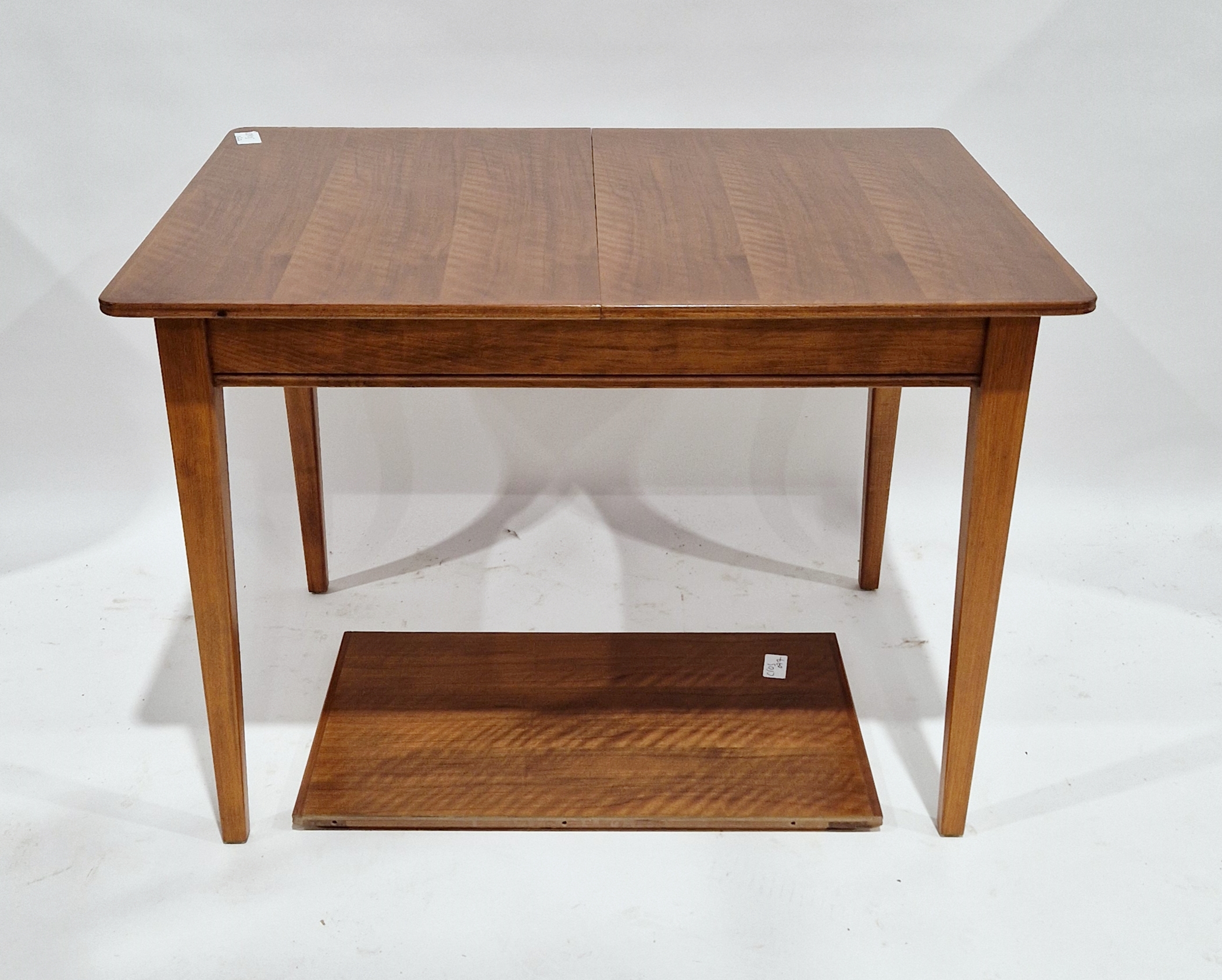 Gordon Russell of Broadway walnut extending dining table on square tapering legs, with single - Image 2 of 2