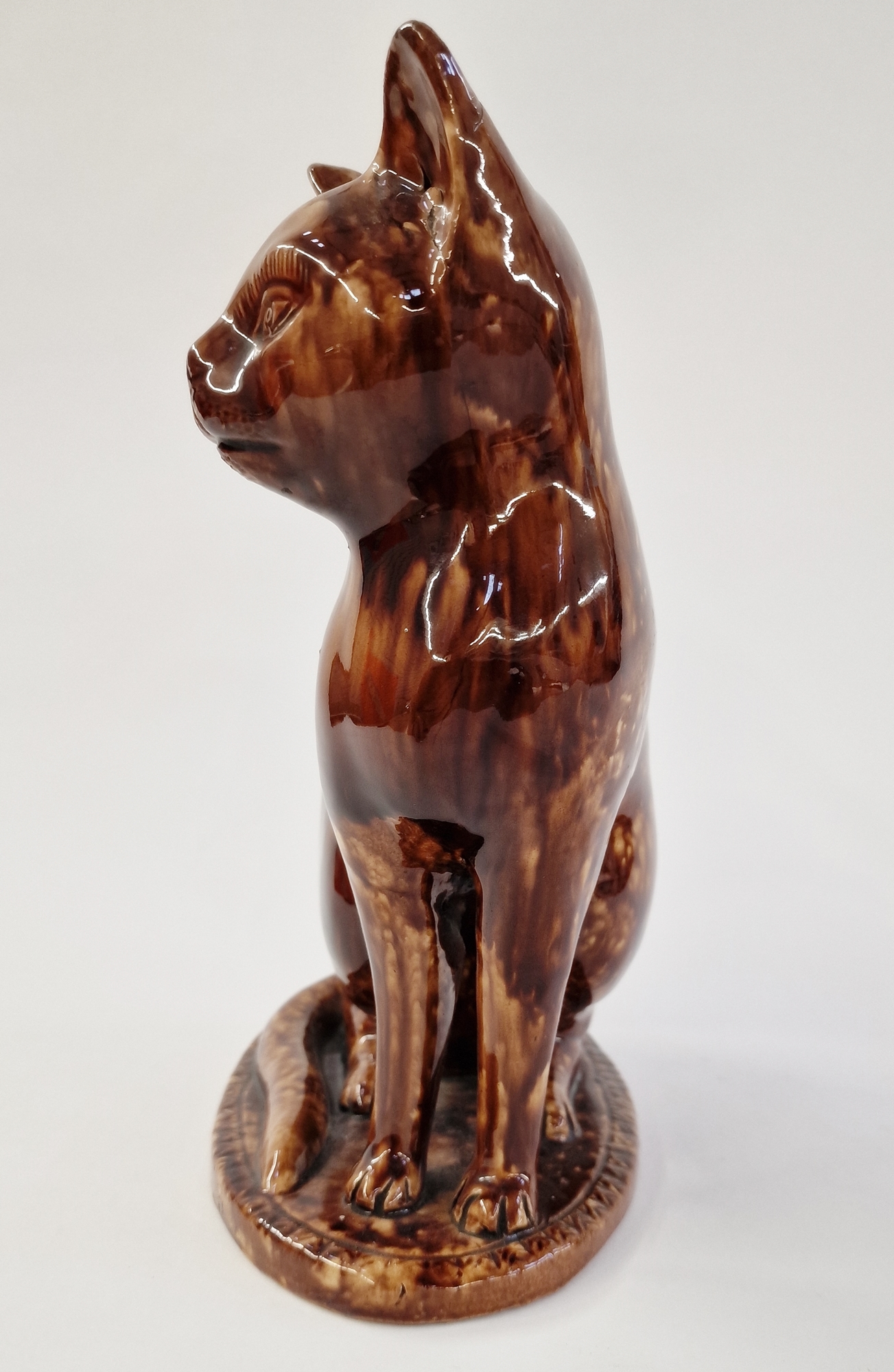 20th century pottery model of a cat, enriched in mottled brown Whieldon-style glaze, modelled seated - Image 2 of 4