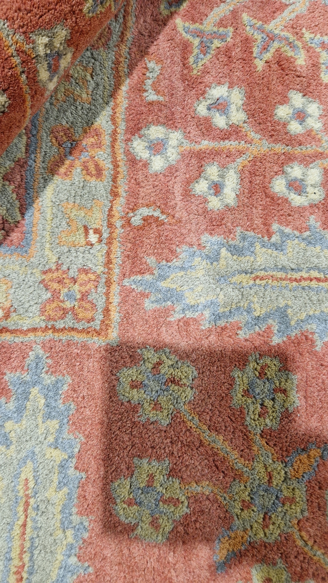 Large wool carpet of revived Eastern style, having stiff leaf and floral spray iron red border and - Image 6 of 22