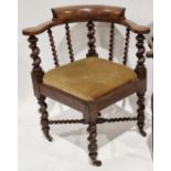 Late 19th/early 20th century oak corner chair with carved spiral supports and X-frame stretcher,