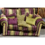 Duresta two-seater sofa covered in a multi-coloured fabric, with a selection of cushions, 166cm wide
