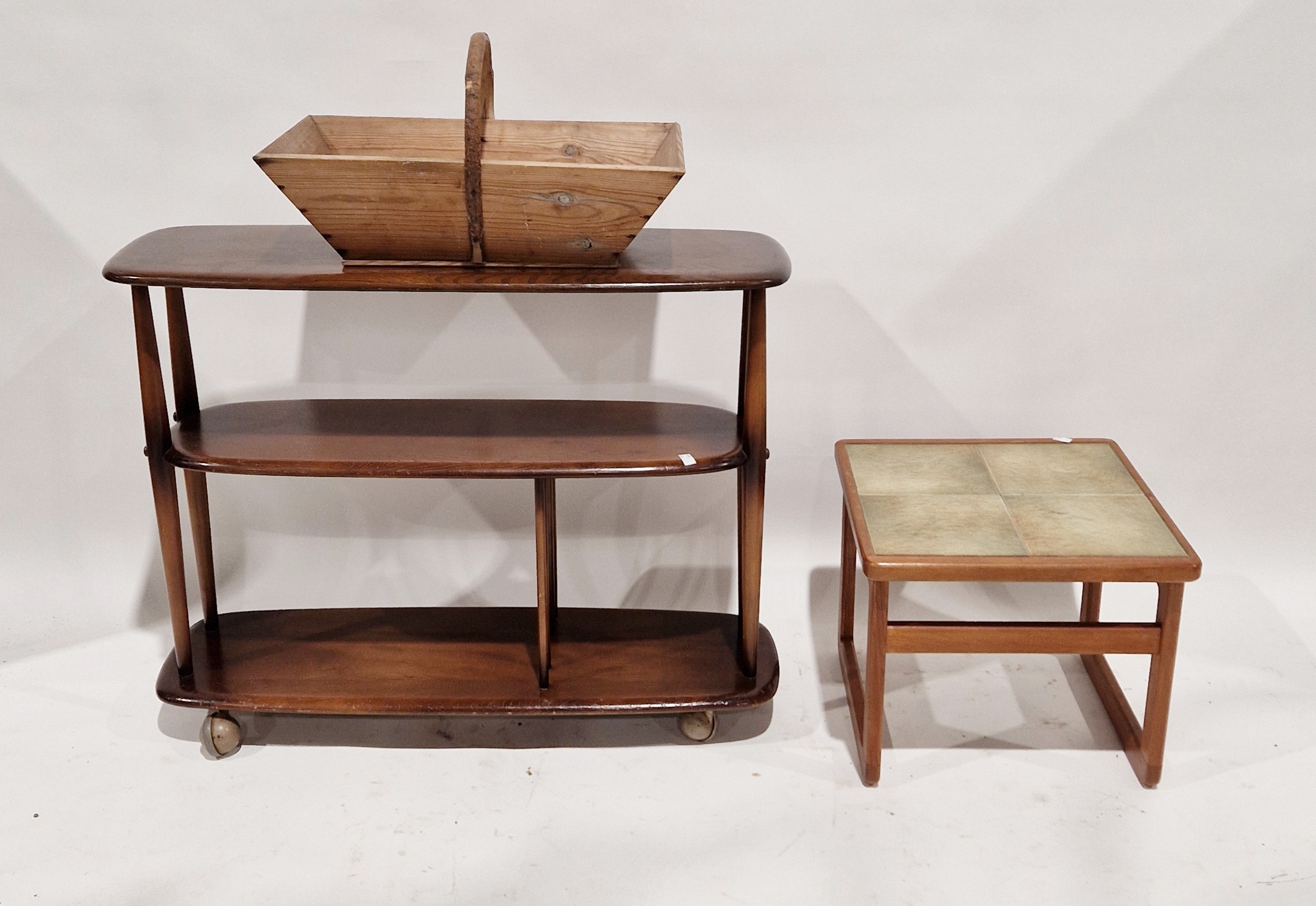 20th century Ercol three-tier occasional table on castors, 91cm wide, a tile-top coffee table and