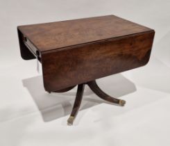 Regency mahogany drop-leaf Pembroke table with frieze drawer, on baluster column support issuing