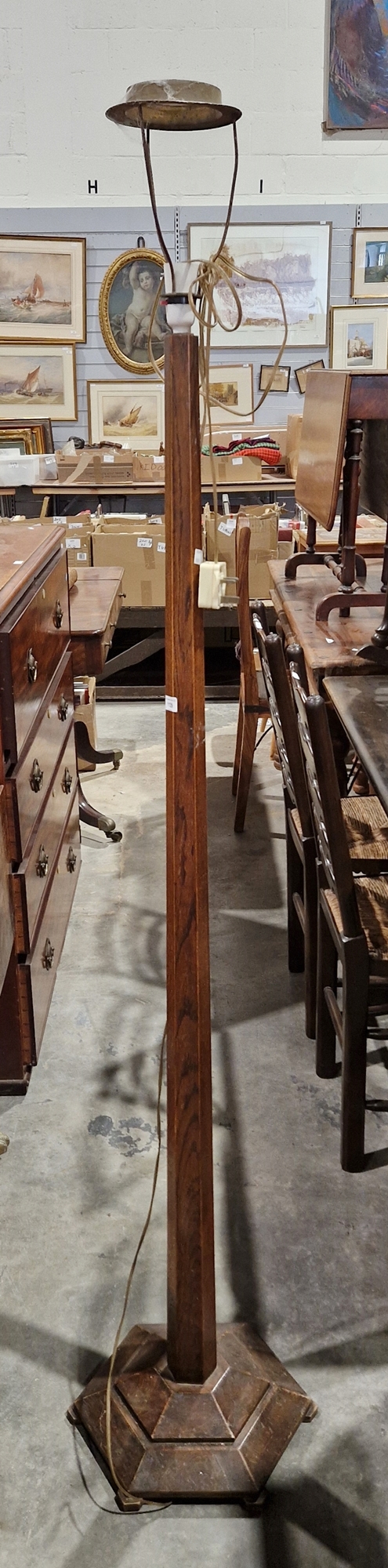 Early 20th century oak standard lamp with hexagonal tapered column and on hexagonal base, 150cm high