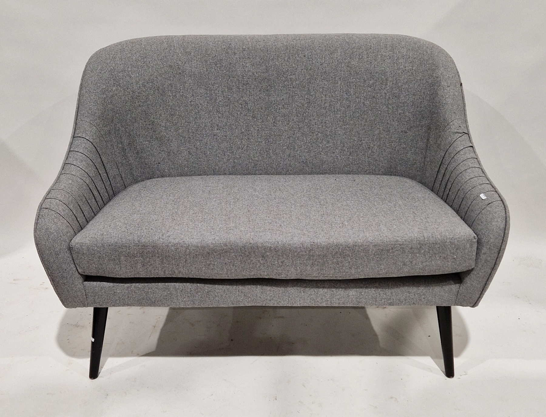 Two grey upholstered two-seater sofas, each raised on tapering legs, 120cm wide (2)