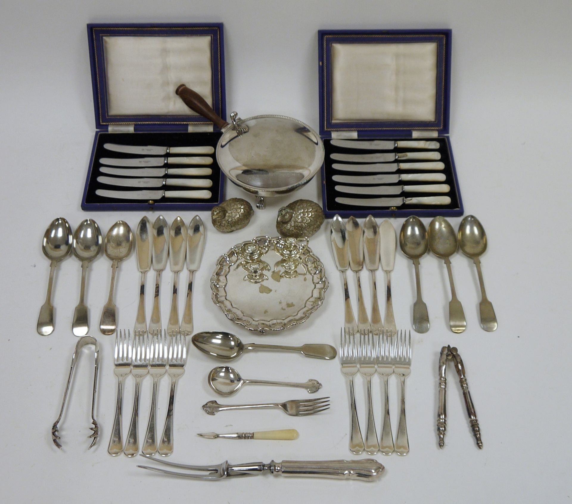 Two sets of mother-of-pearl handled fruit knives, a Mappin & Webb Georgian-style piecrust