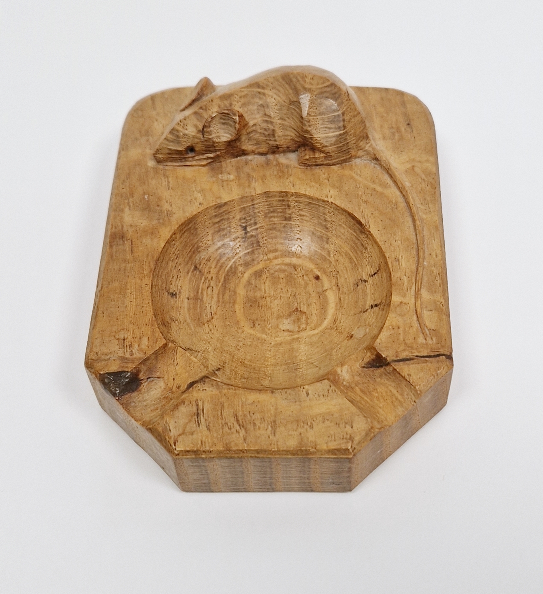 Carved oak 'Mouseman' canted rectangular ashtray by Robert Thompson of Kilburn, with central well,