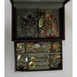 Quantity of costume jewellery to include silver chains, necklaces, brooches and silver-coloured