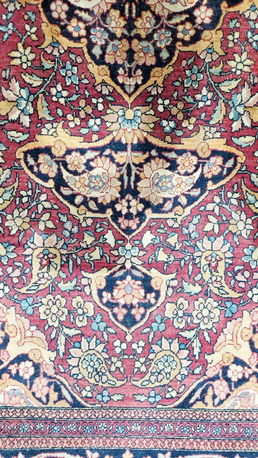 Eastern wool rug of Persian design, having black arabesque to the cherry red field with allover - Image 6 of 32