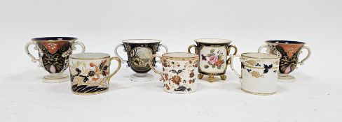 Group of Derby porcelain two-handled cups and a group of English porcelain coffee cans, circa 1820'