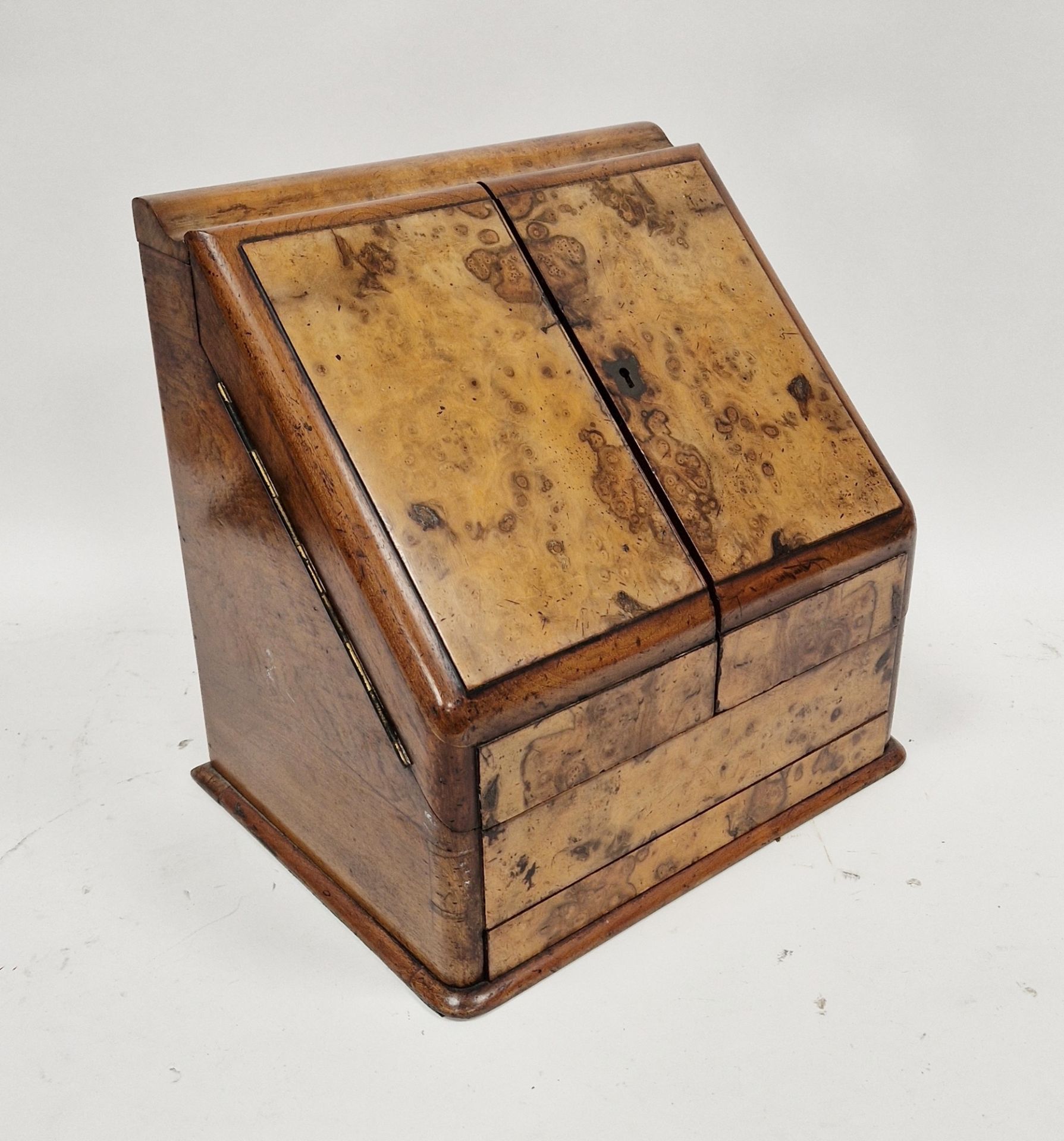 Victorian walnutwood and burr yew stationery cabinet, the hinged ogee mould top opening to reveal