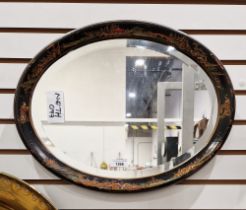 Early 20th century lacquered chinoiserie oval bevelled edged easel mirror, 35cm x 45cm  Condition