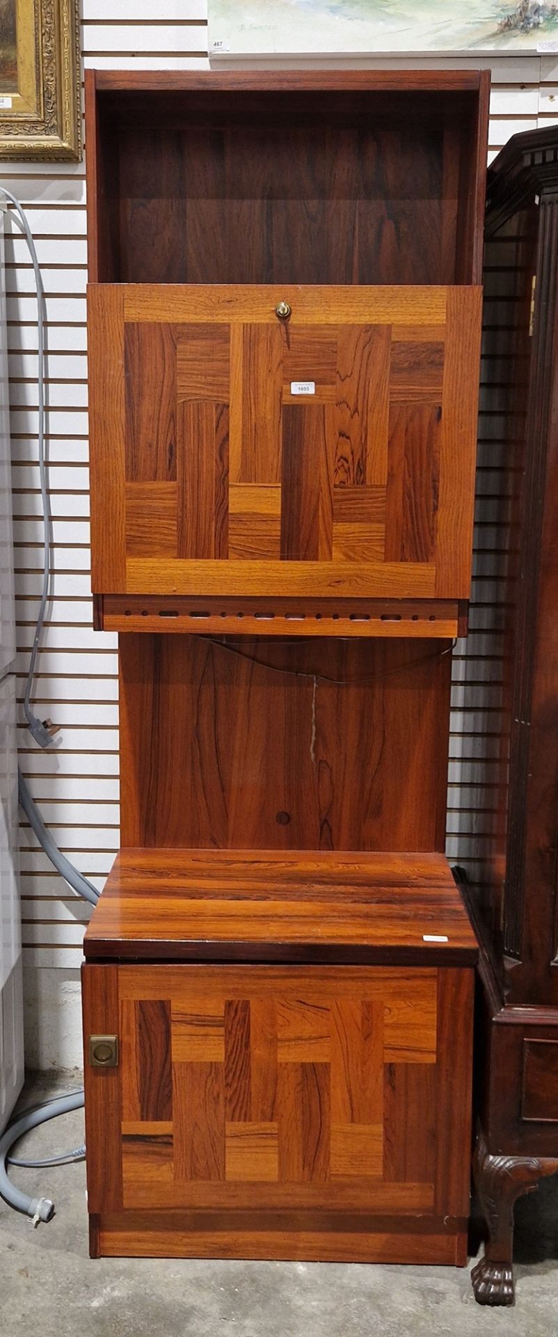 20th century veneered storage cupboard, having a fall front cupboard over a single door cupboard,