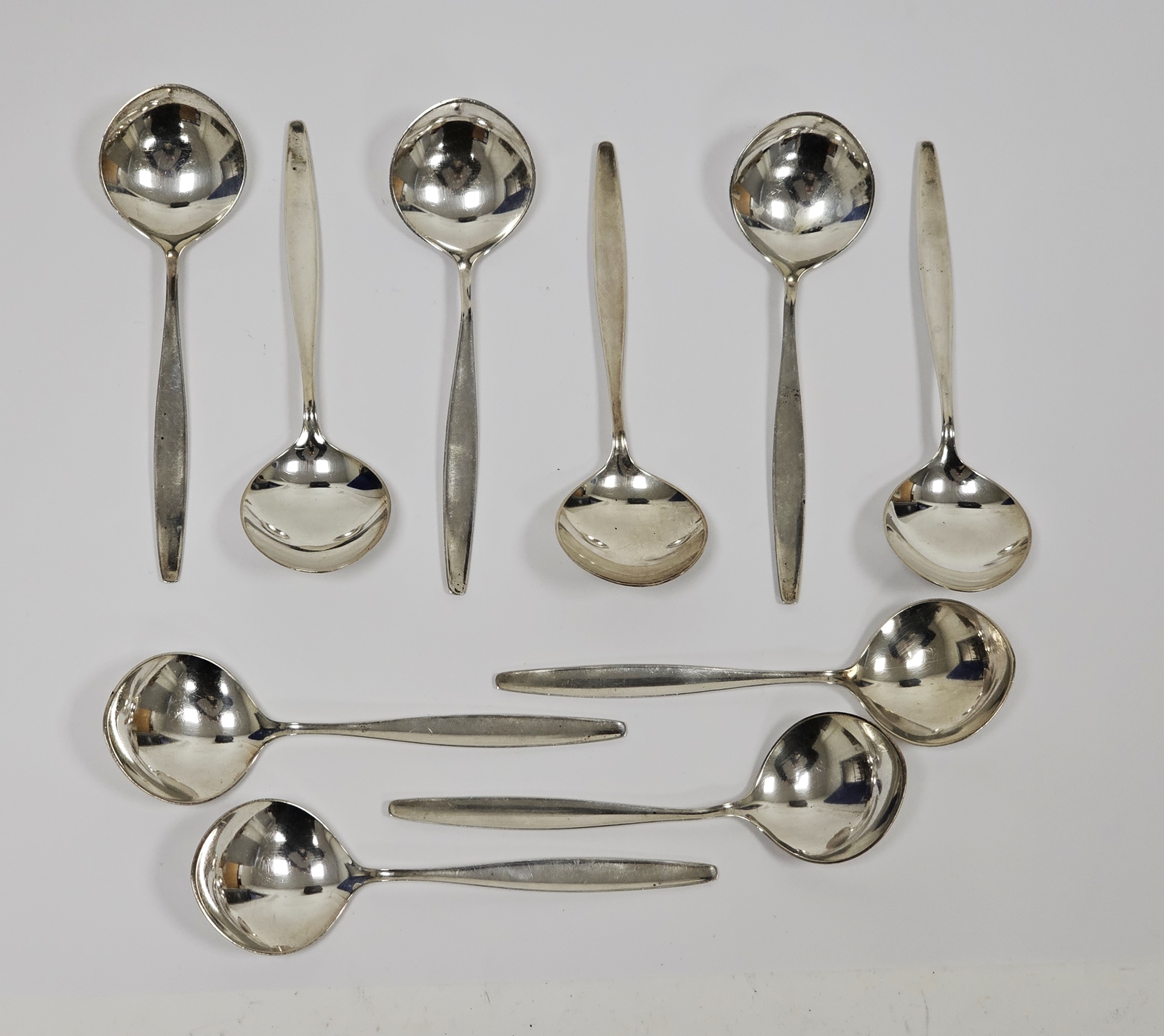 Set of 10 Danish silver soup spoons by Georg Jensen, in the Cyprus pattern, total weight 9ozt