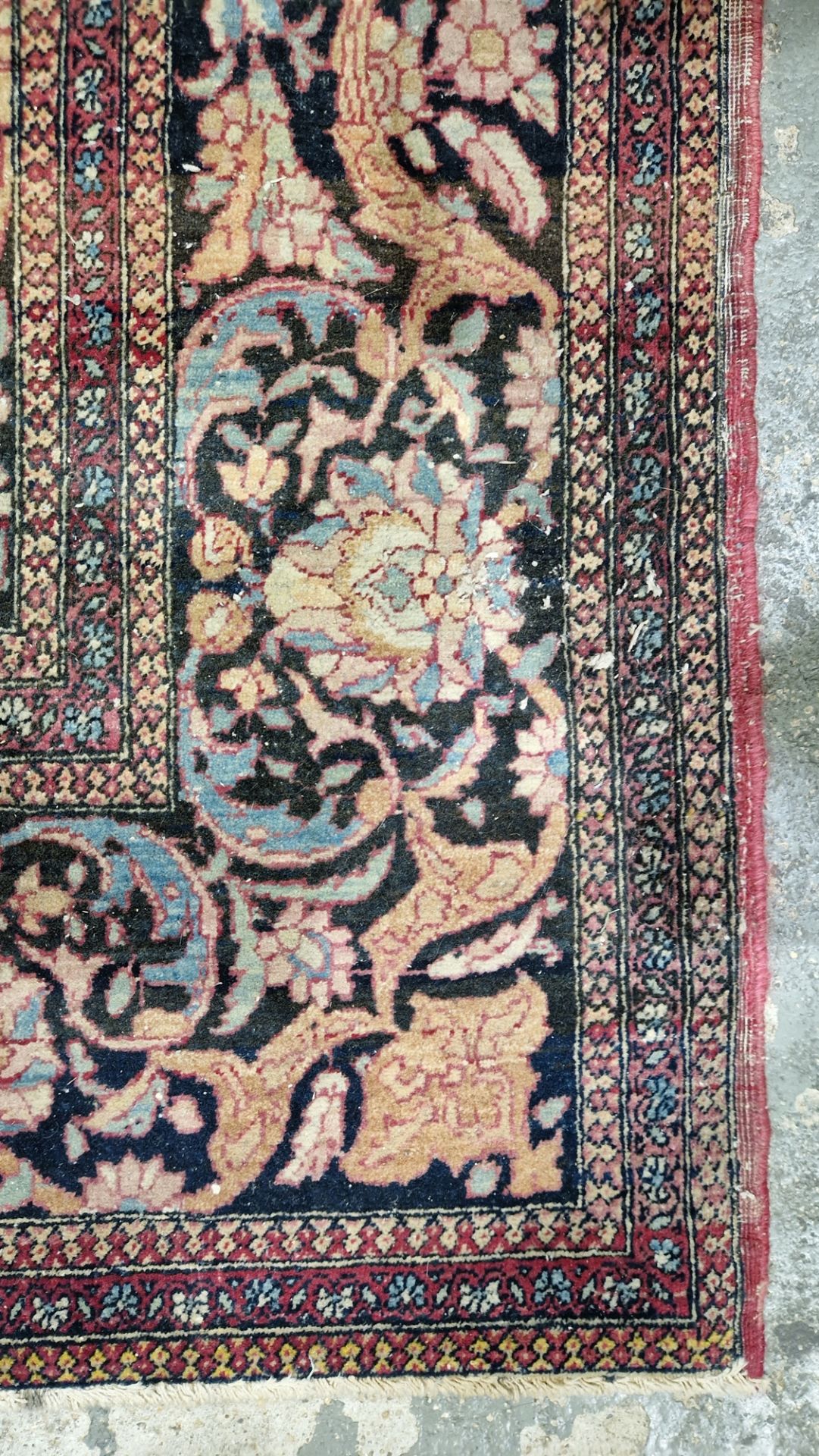 Eastern wool rug of Persian design, having black arabesque to the cherry red field with allover - Image 16 of 32